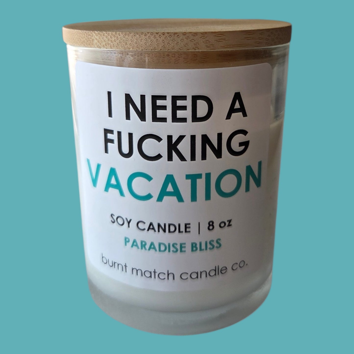 I NEED A FUCKING VACATION CANDLE BY BURNT MATCH CANDLE CO.